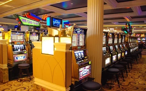 Rows of slot machines on a casino floor